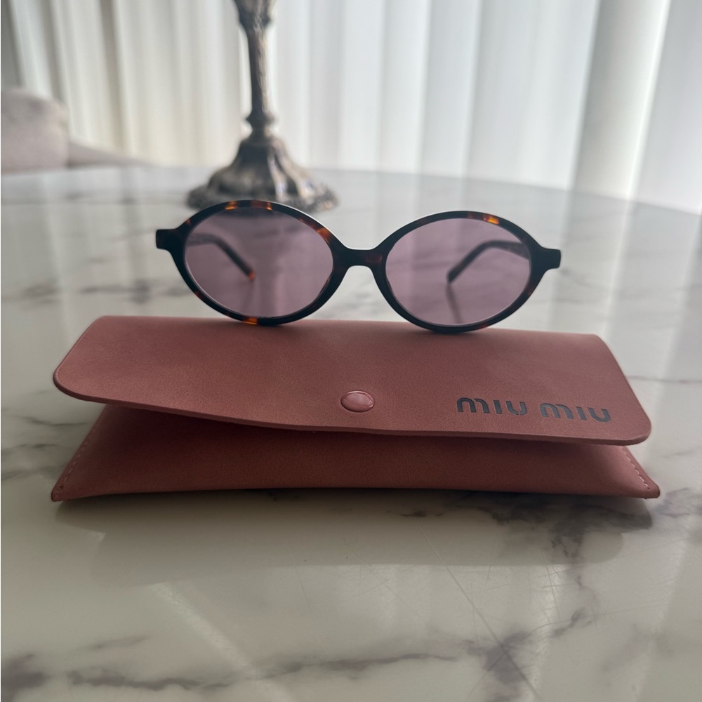 Miu Miu Tortoiseshell Oval Sunglasses with Pink Lenses